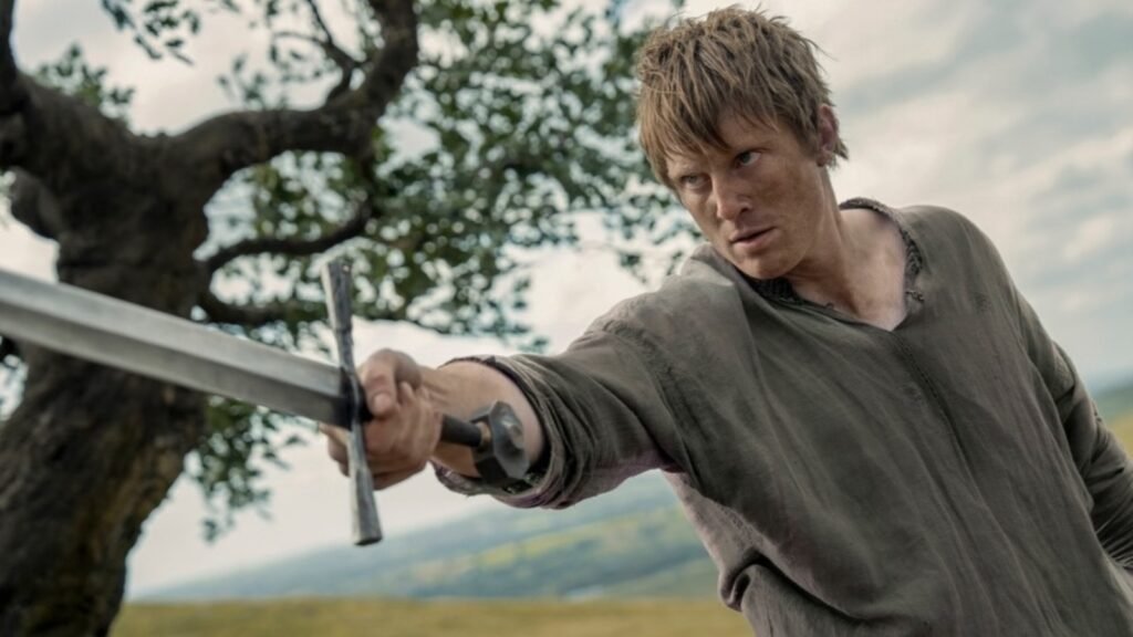 A Knight of the Seven Kingdoms new image from HBO adaptation. Ser Duncan the Tall holding a sword in A Knight of the Seven Kingdoms, showing a more battle-ready portrayal than the book version