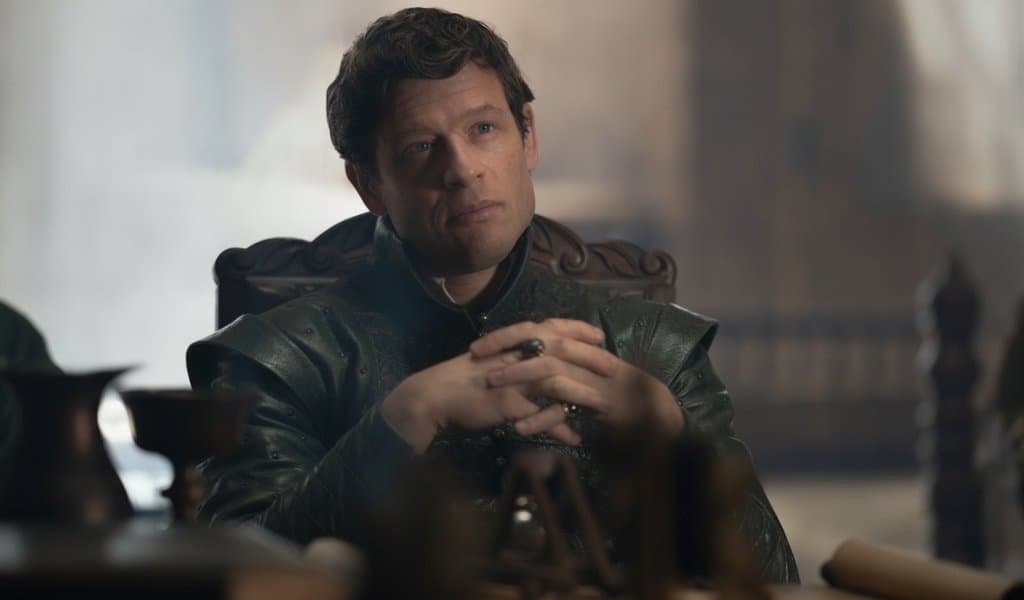 James Norton as Lord Ormund Hightower sitting at the council table in House of the Dragon season 3
