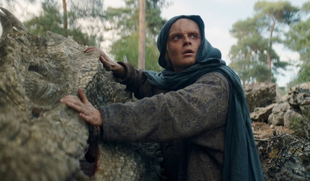 King Aegon II Targaryen emotionally reuniting with his wounded dragon Sunfyre at Rook's Rest.